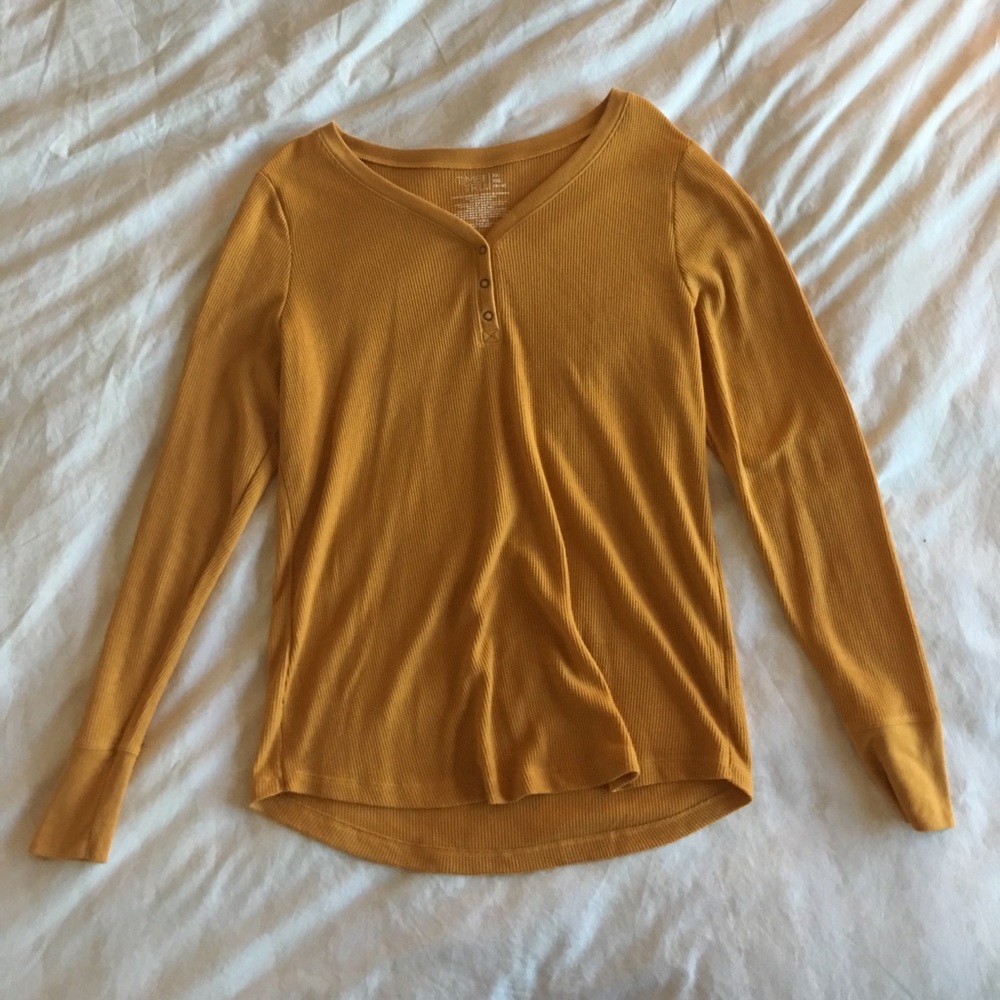 yellow long sleeve shirt